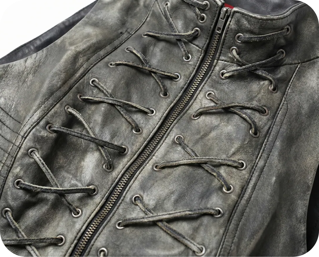 Close-up of laced leather vest material